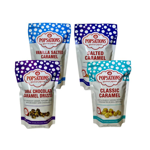 Four packages of Popsations caramel popcorn in resealable bags